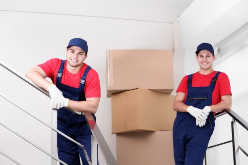Man and van service with moving van and packed boxes