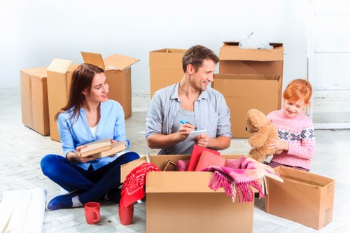 Furniture pick-up team collecting bulky household items in Sutton