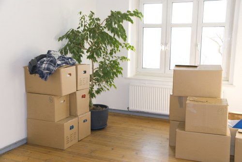 Moving team handling belongings with care during a Sutton van service