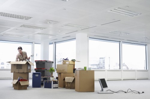 Local office movers handling furniture and boxes in Sutton commercial premises